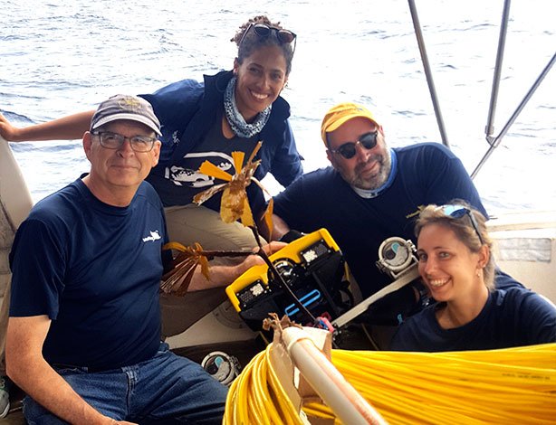 A very happy team following the successful operation of sampling of a kelp specimen using a robotic arm on the Pro5 ROV. Starting from the left Tom Glebas, Salome Buglass, Andy Goldstein, Alize Bouriat
